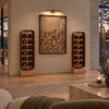A modern, well-lit living room featuring a minimalist wine display and stylish cork furniture.