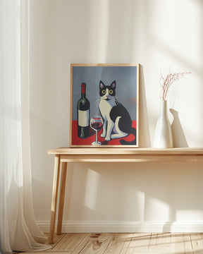 Black and White Cat On Red Table Poster